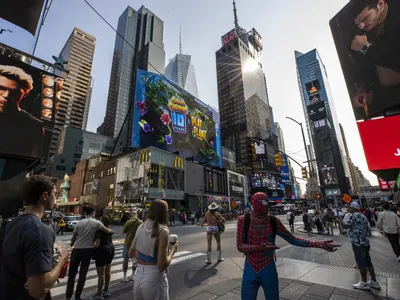 Luckily for tourists and passers-by, this longtime Times Square performer is not as naked as his underwear suggests.

