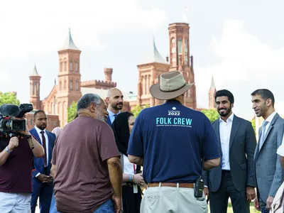 Secretary Bunch meeting by the Castle at the 2022 Folklife Festival