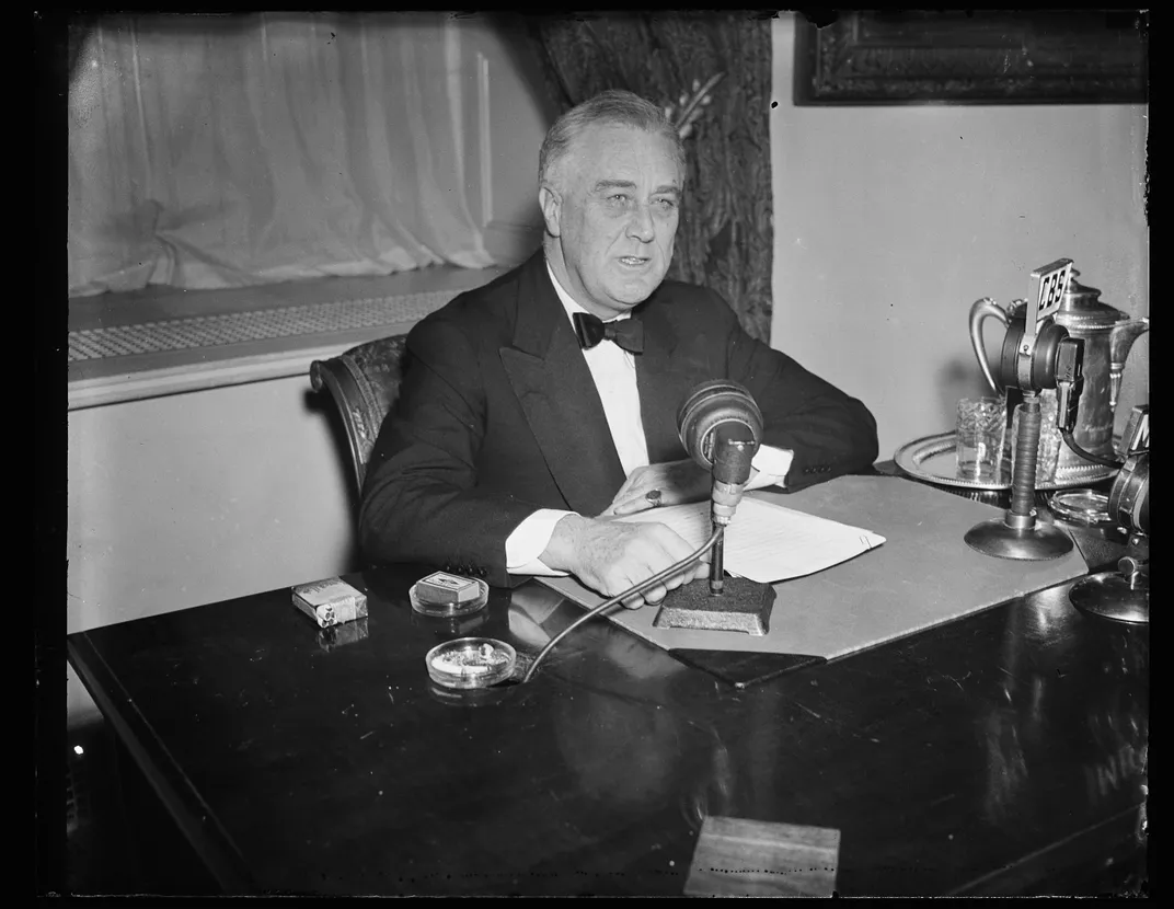 Franklin Delano Roosevelt delivers a radio broadcast in 1933, the year of a failed attempt on his life.