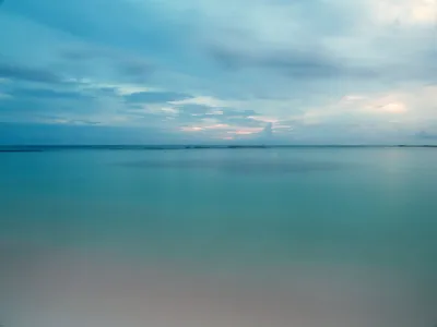 Where does the ocean end and the sky begin? It&rsquo;s a little hard to tell as the sun sets on Aruba&rsquo;s Baby Beach.