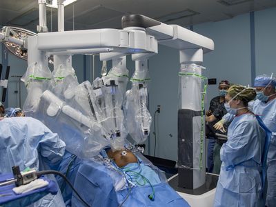 The da Vinci surgical robot, shown here on a US Navy hospital ship, is one of the most widely used devices to assist doctors in laparoscopic surgery. The procedure &mdash; in which tools are inserted through tiny holes in the abdomen instead of cutting a long incision &mdash; allows patients to recover more quickly.