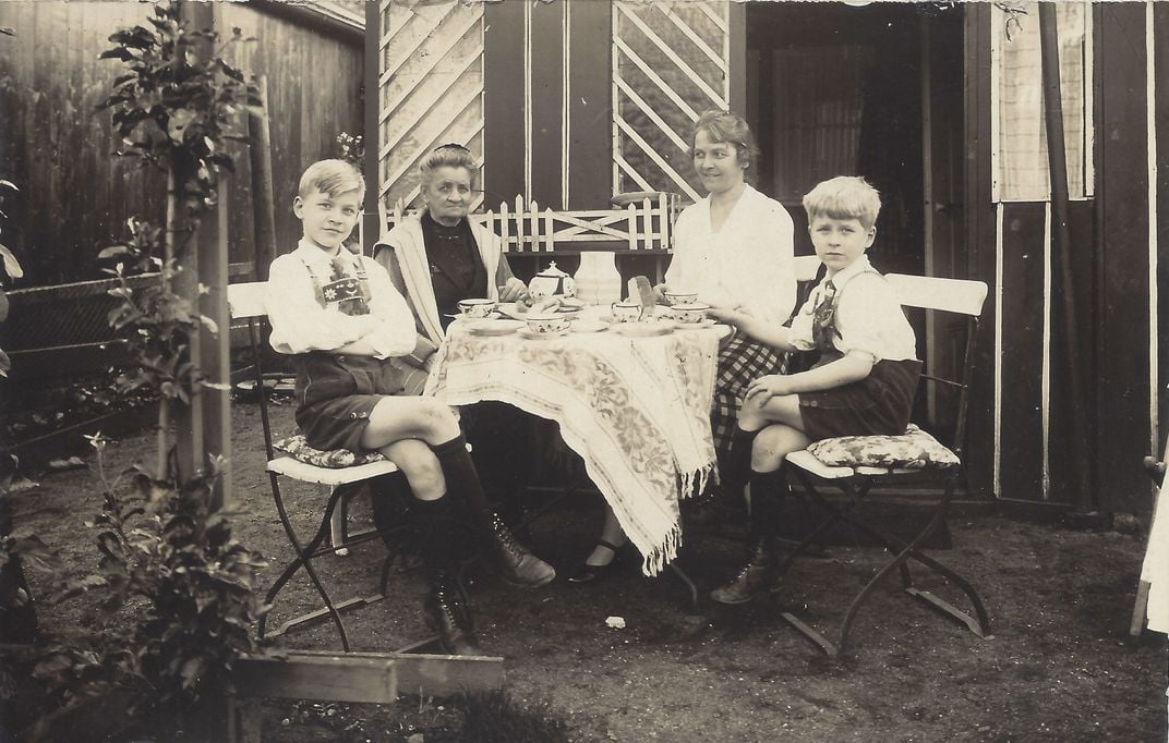 Wolfgang and Fanny Angelina Hesse are seated on the left side of this photograph, taken in Dresden in 1930.