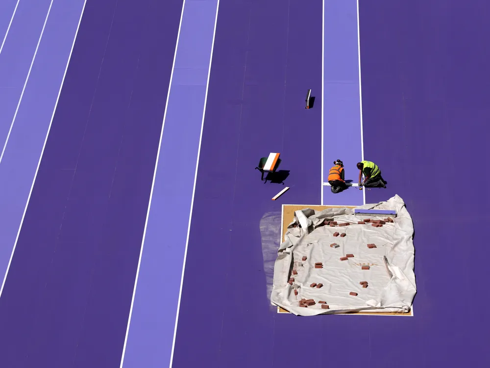 Overhead view of purple Olympics running track