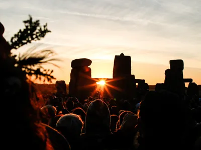 Crowds gather for the summer solstice at Stonehenge in Wiltshire, England.