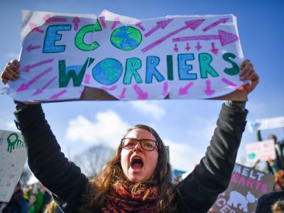 School children protest climate change outside the Scottish Parliament in 2019 as part of a worldwide demonstration.