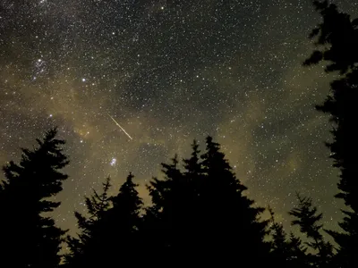 The Perseids occur when Earth passes through the debris field of the comet 109P/Swift-Tuttle.